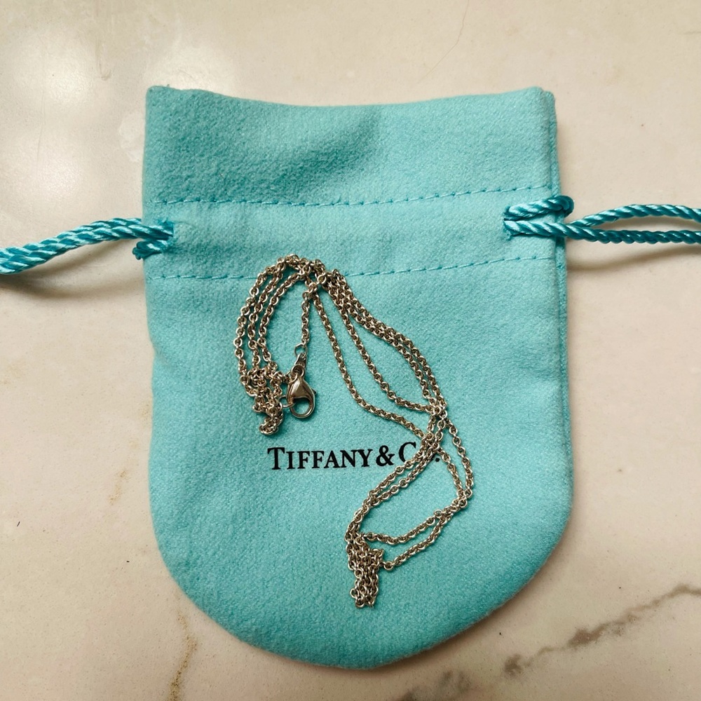 Authentic Tiffany & Co. Sterling Silver Chain in 18” long.
Links, size small.